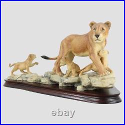 African Lioness and Cubs Border Fine Arts