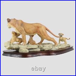 African Lioness and Cubs Border Fine Arts