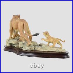 African Lioness and Cubs Border Fine Arts