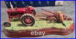 BORDER FINE ARTS'MAKING ADJUSTMENTS' A2142 McCormick Farmall Tractor Boxed