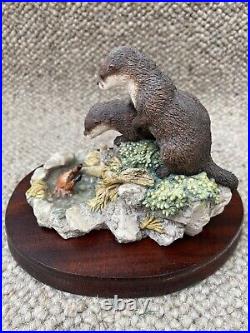 Beachcombers Border Fine Arts Otters with Crab on plinth. Artist Ayres. Signed