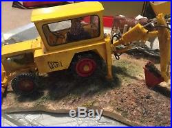Border Fine Arts Laying the Clays JCB Digger