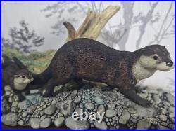 Border Fine Arts Otter Family'Keeping Up' B0333 Mounted Ceramic Figurine