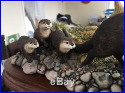 Border fine Arts, KEEPING UP Otter with young following, OTTERS, on a Plinth L/E