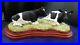 Border-fine-arts-Chewing-the-cud-Friesian-cows-A0904-on-plinth-01-et