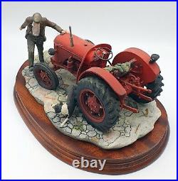 Border fine arts figurine Kick start Farmer & tractor with dog Mint/boxed