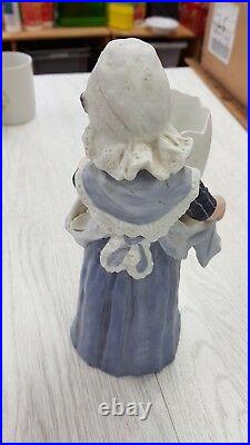 Heubach bisque german girl with egg figurine 25cm tall